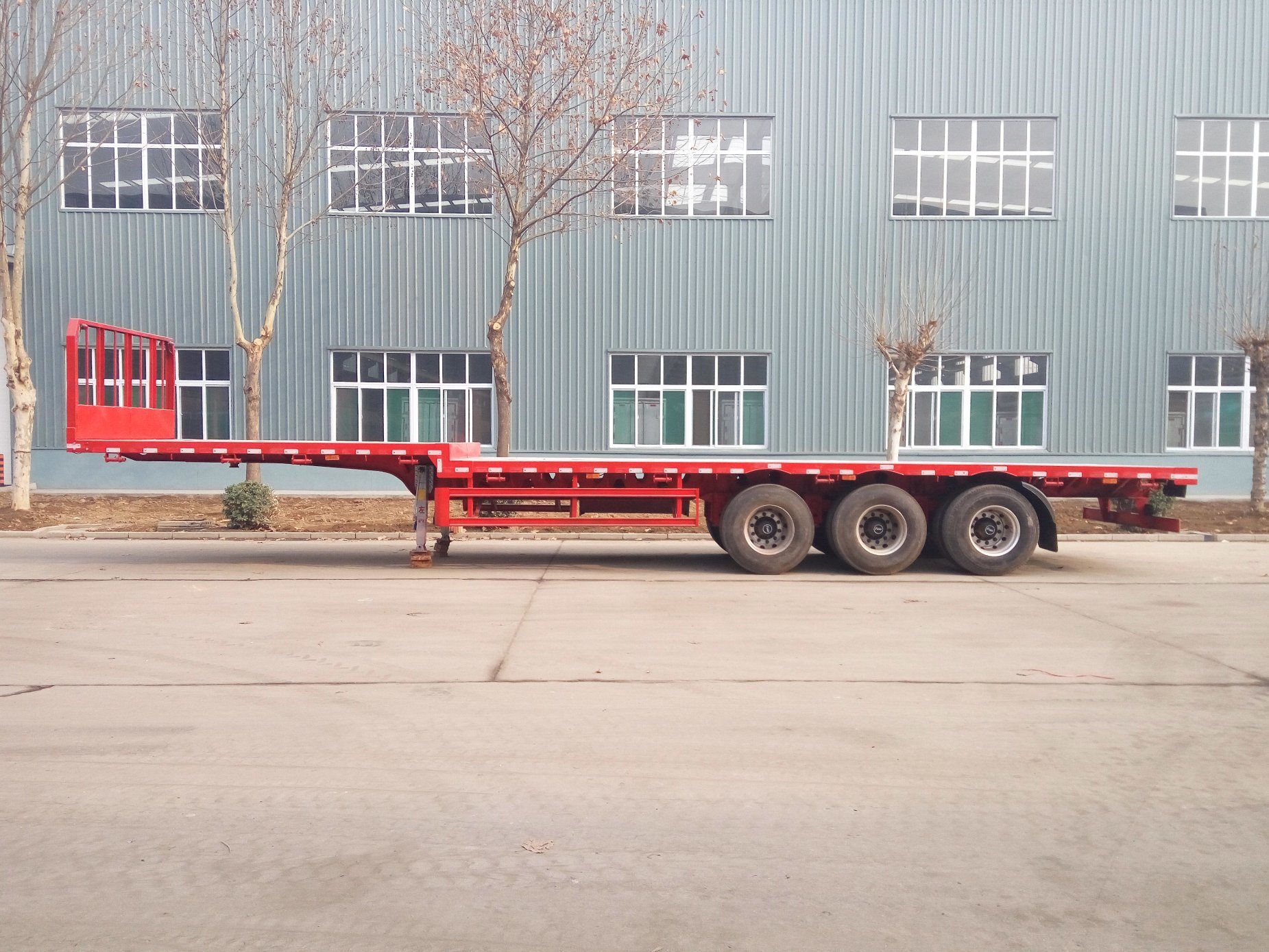 China 3/Tri Axles 60 Tons 20 FT 40FT Container Shipping Flat Deck High Bed Platform Flatbed Truck Semi Trailer
